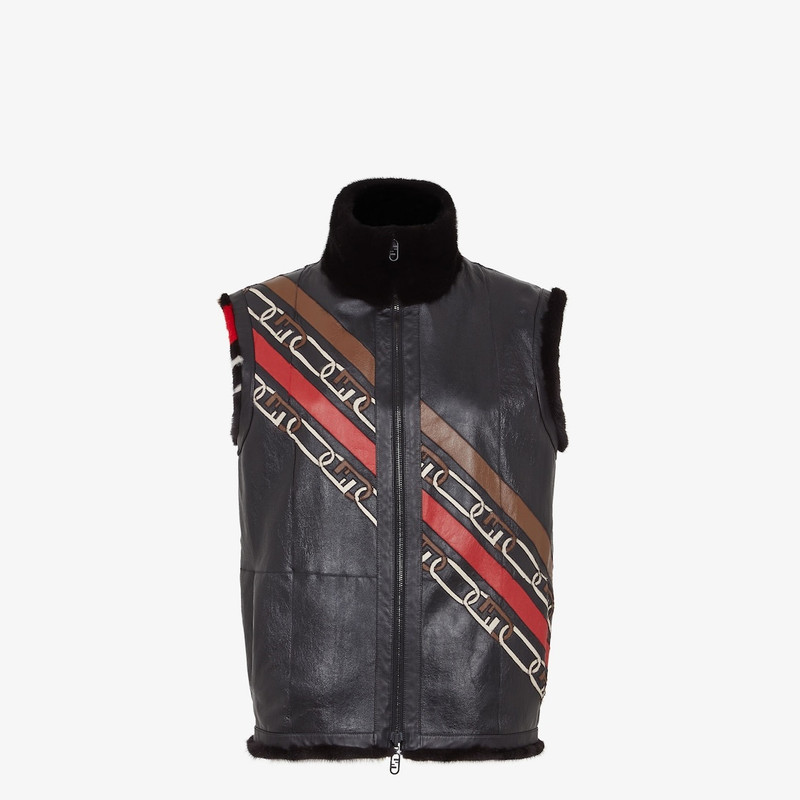 Gilet with high collar. Welt pockets. Zip fastening with double slider. Made of black mink. Embellis 4