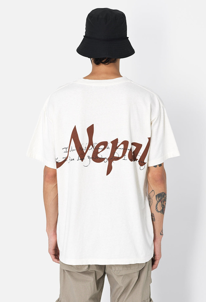 John Elliott NEPAL UNIVERSITY TEE outlook