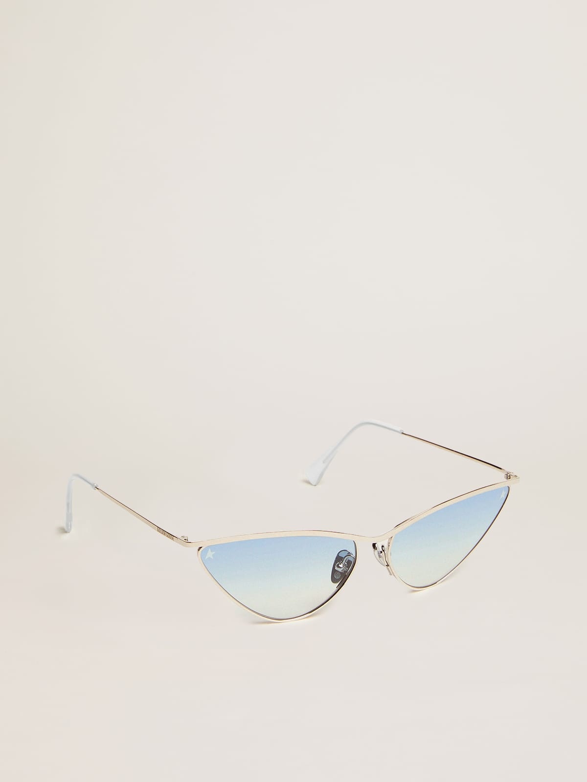 Sunglasses cat-eye style with silver frame and blue lenses - 1