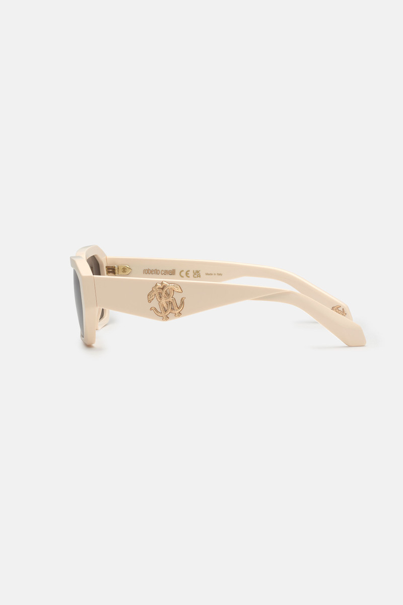 Sunglasses with wide rectangular front and fangs 4