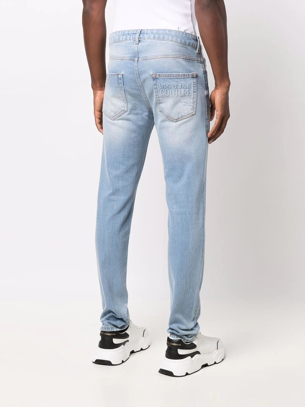 logo-embossed straight jeans - 4