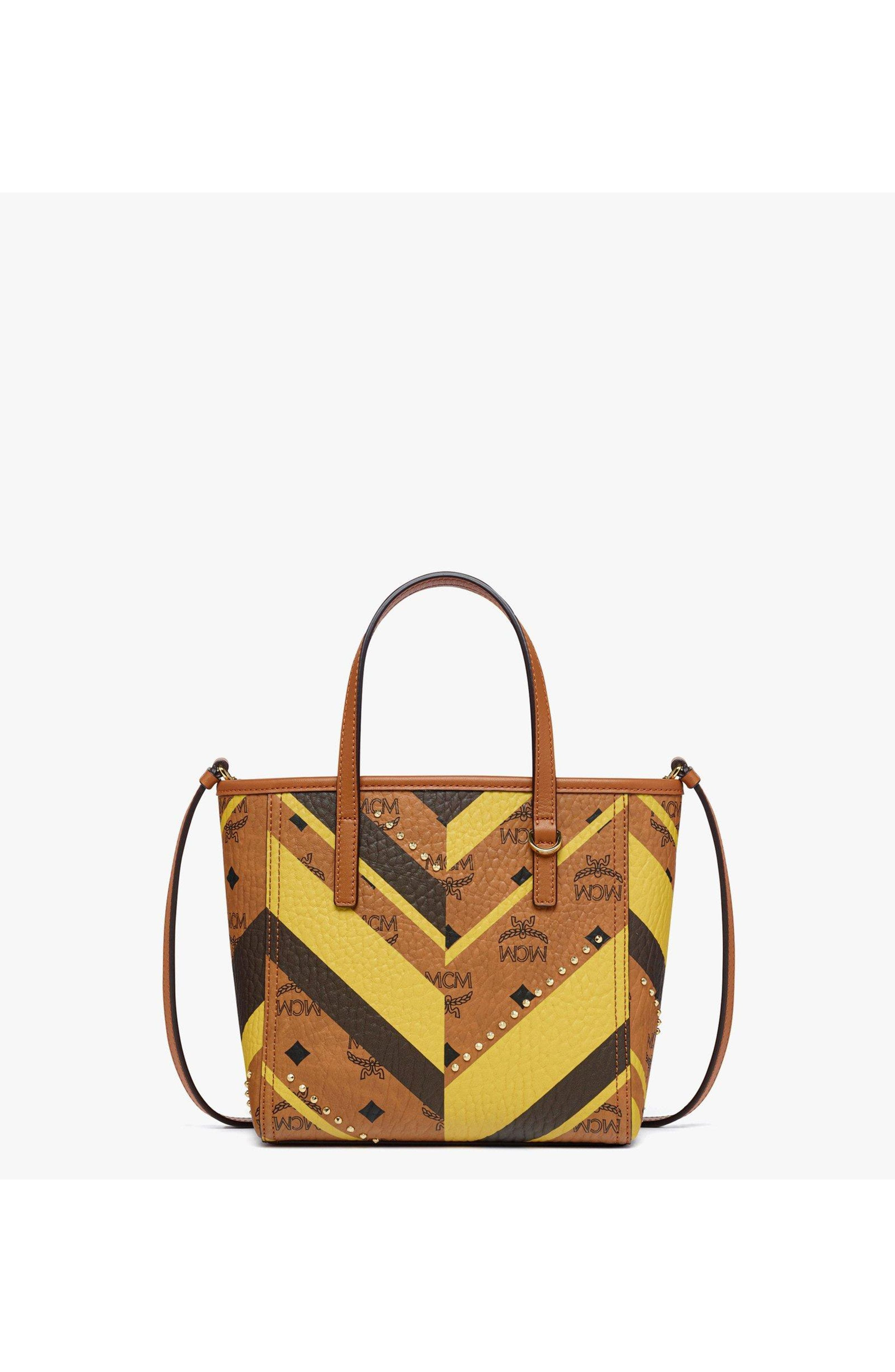 MCM Studded Toni Top-Zip Shopper in Mega Herringbone Visetos in Cognac at Nordstrom - 1