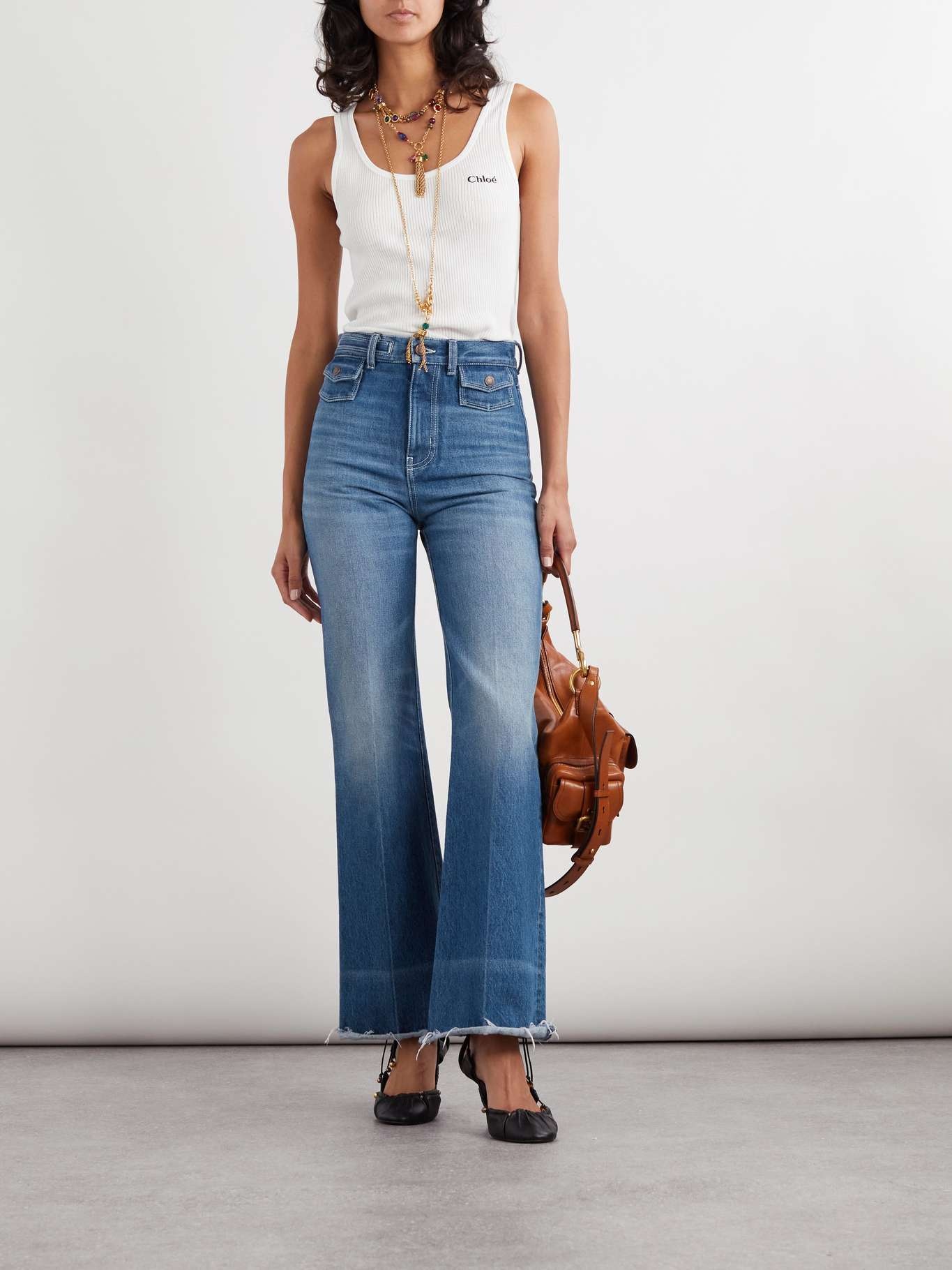 Chloé Frayed high-rise flared jeans Blue | REVERSIBLE