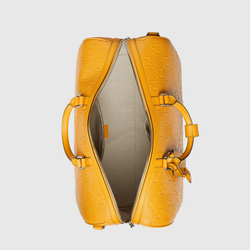 GG embossed duffle bag 7