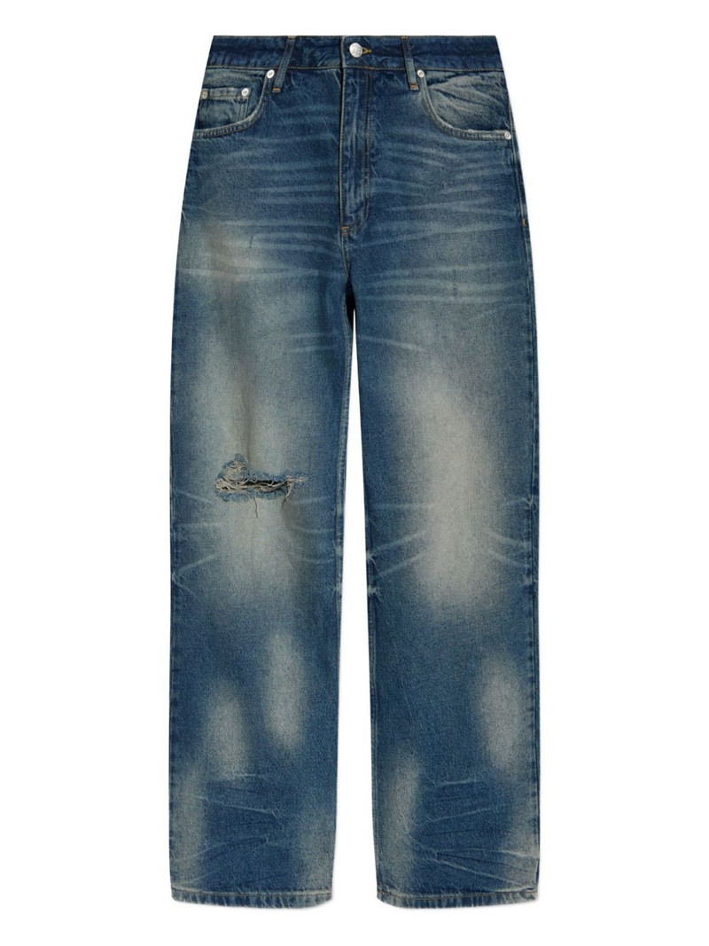 frayed-knee jeans 1
