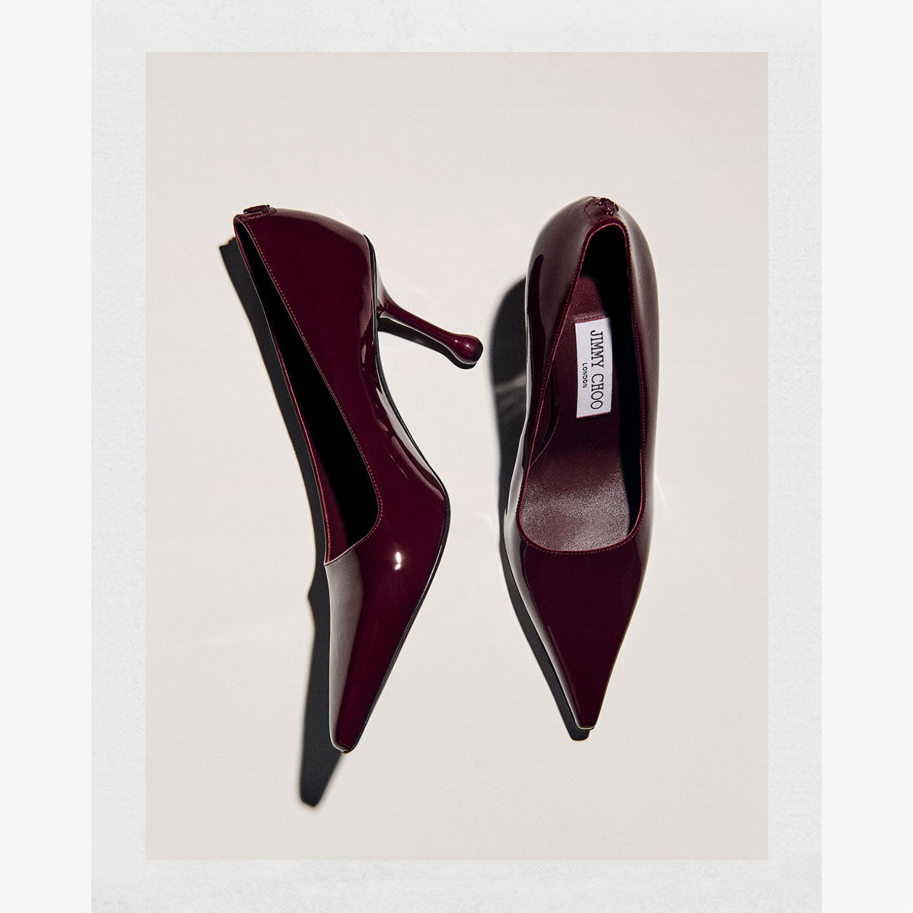 Ixia 80
Garnet Patent Leather Pumps - 6