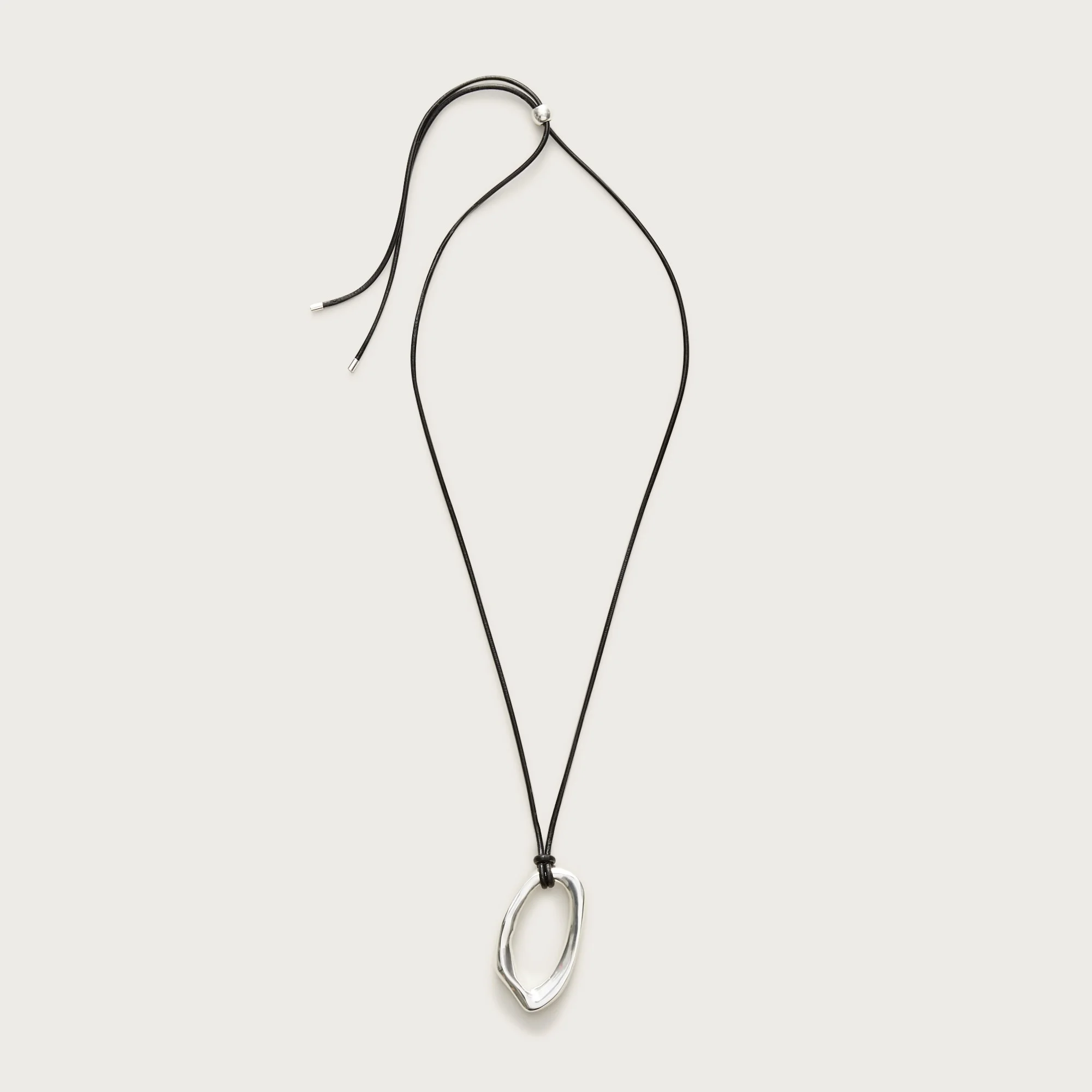 Oval pendant necklace with leather cord - 1