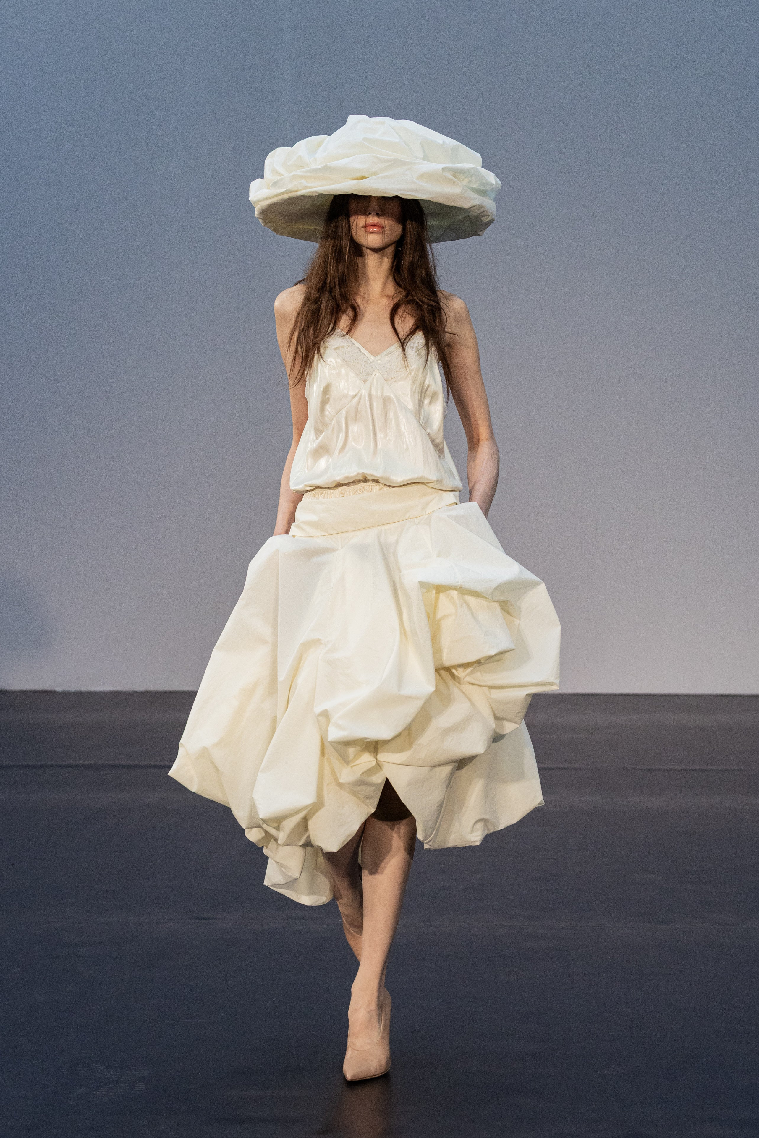 Draped skirt with sculptural volume in cream - 3