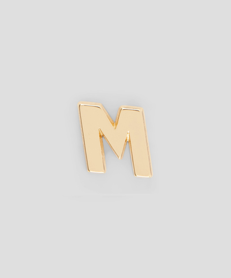 Single brass M charm 1