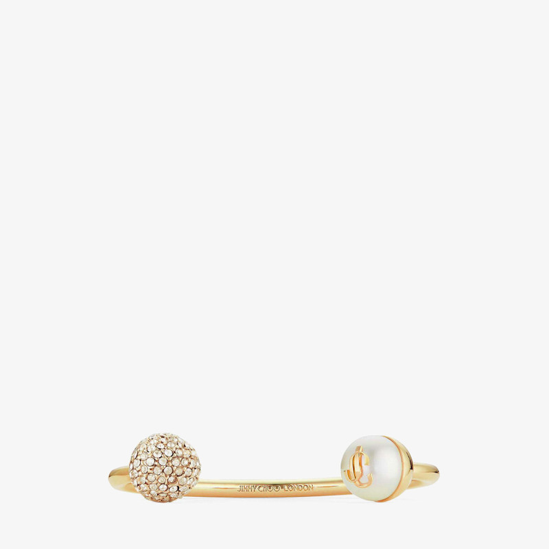 JC Crystal Cuff
Gold-Finish Metal Cuff Bracelet with Pearl and Swarovski Crystal Embellishment 5
