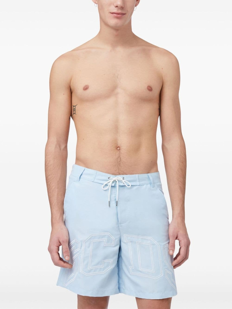 GCDS logo-print swim shorts outlook