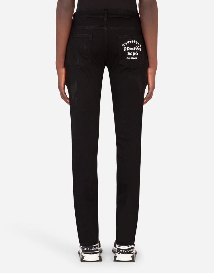 Black skinny stretch jeans with logo print - 2