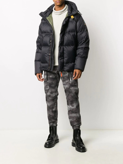 White Mountaineering camouflage-print cargo trousers outlook