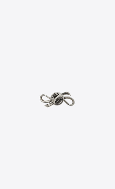 SAINT LAURENT rhinestone knot pin in metal outlook