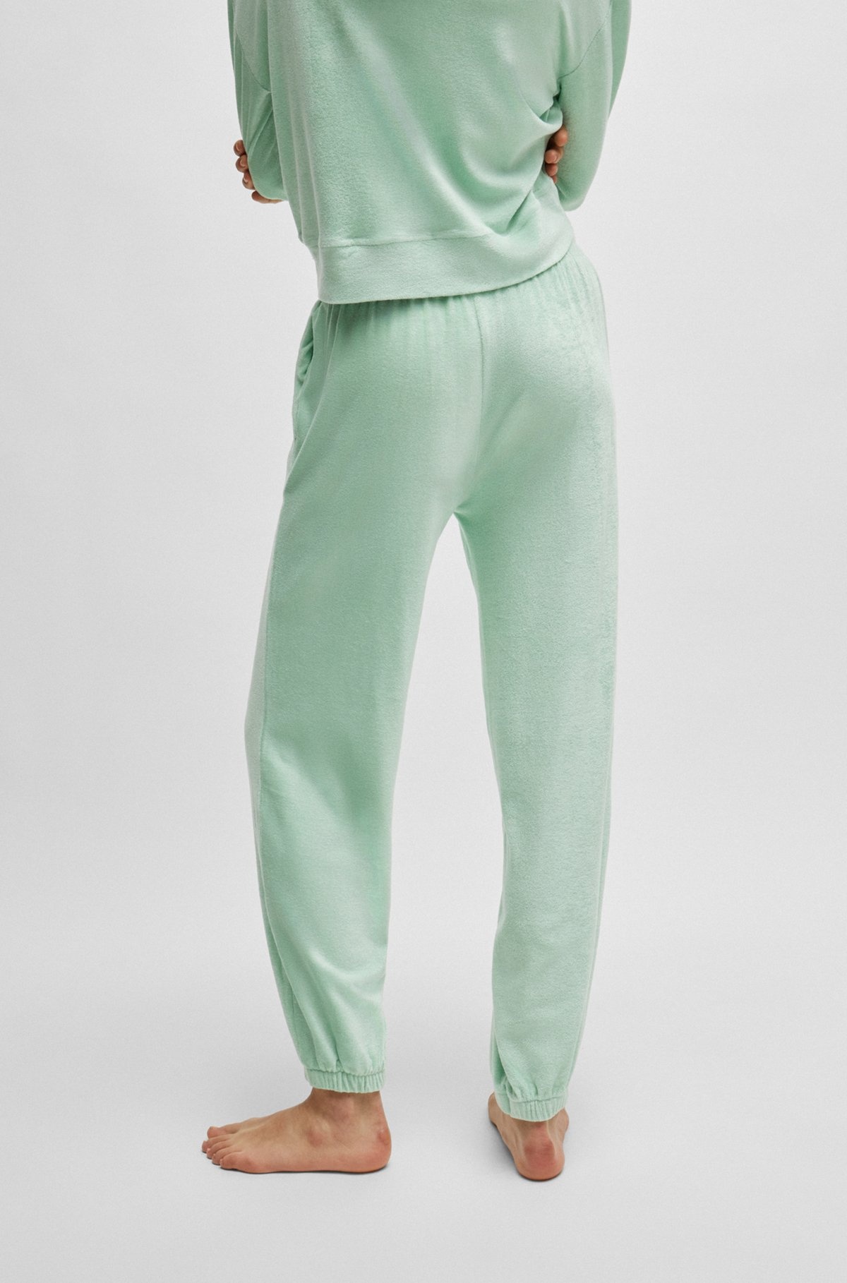 CUFFED TRACKSUIT BOTTOMS IN TERRY FABRIC WITH HANDWRITTEN LOGO - 5