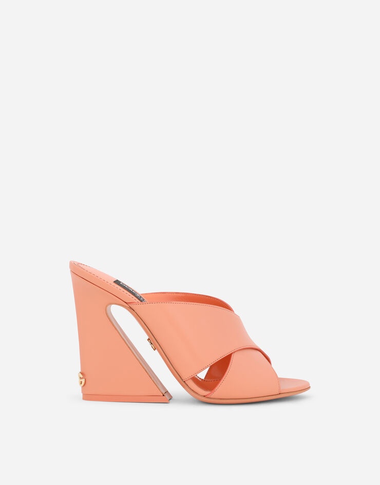 Calfskin mules with geometric heel - 1