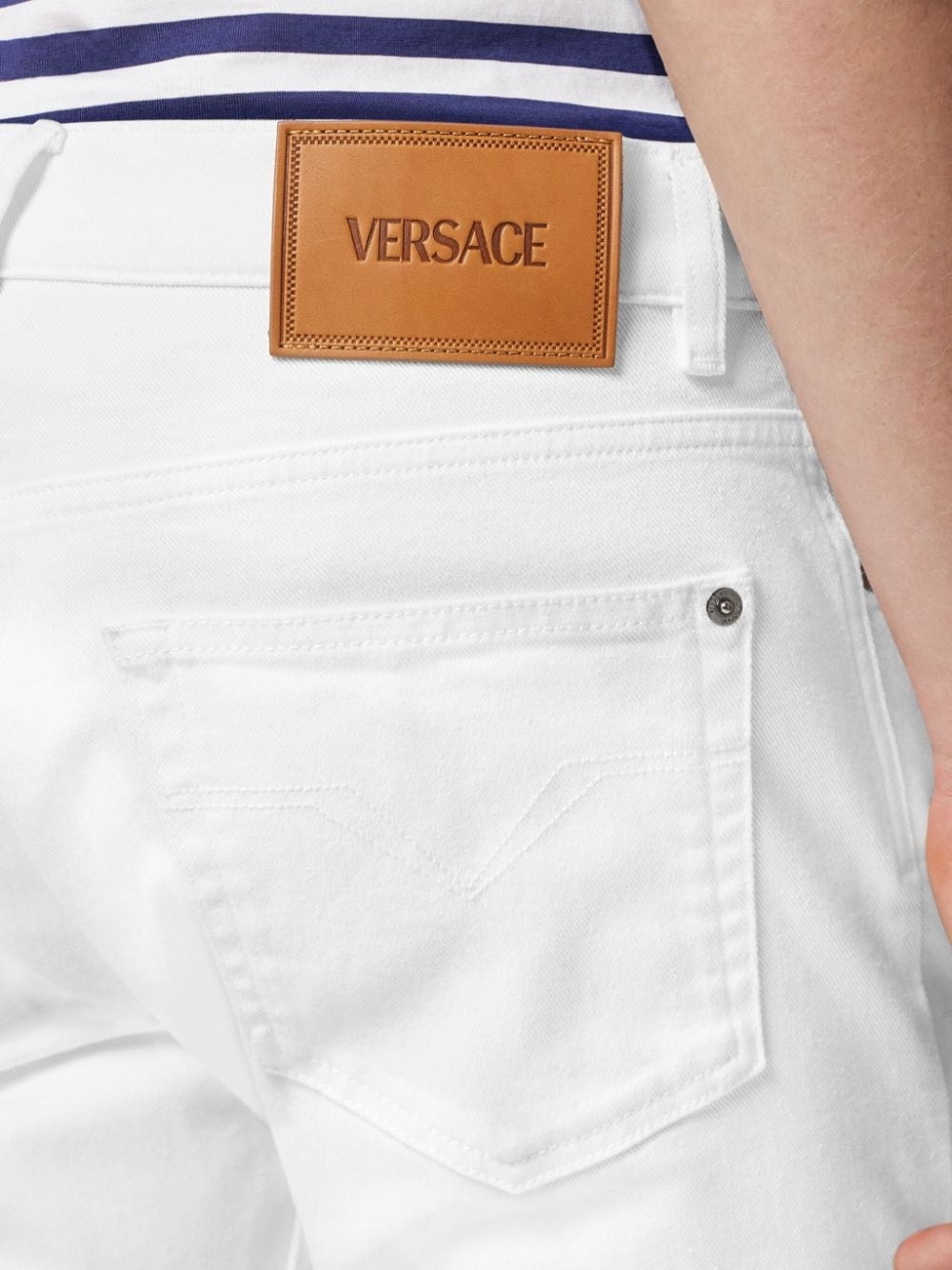 Medusa Head detail straight-legged jeans - 4