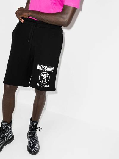 Moschino Double Question Mark-print shorts outlook