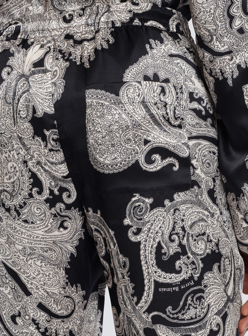 Paisley print silk trousers 8