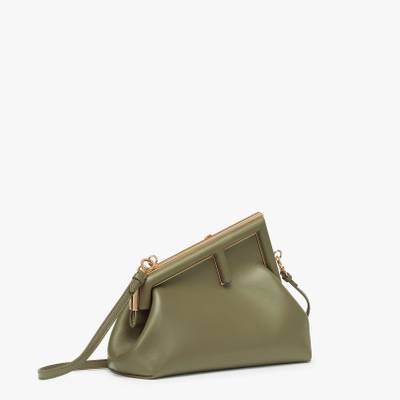 FENDI Small Fendi First bag made of soft, dark green nappa leather with oversized metal F clasp bound in t outlook