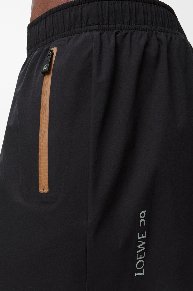 Performance shorts in technical shell 5