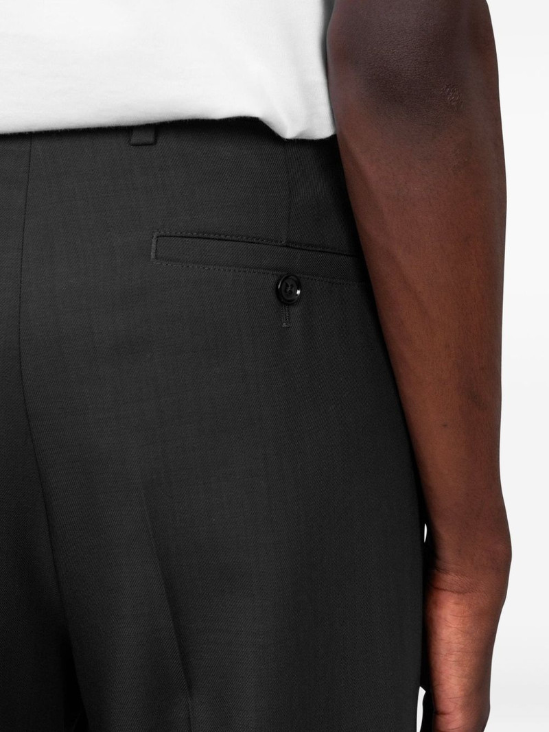 button fastening trousers 5