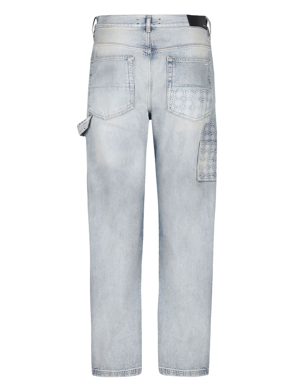 monogram-debossed jeans - 2