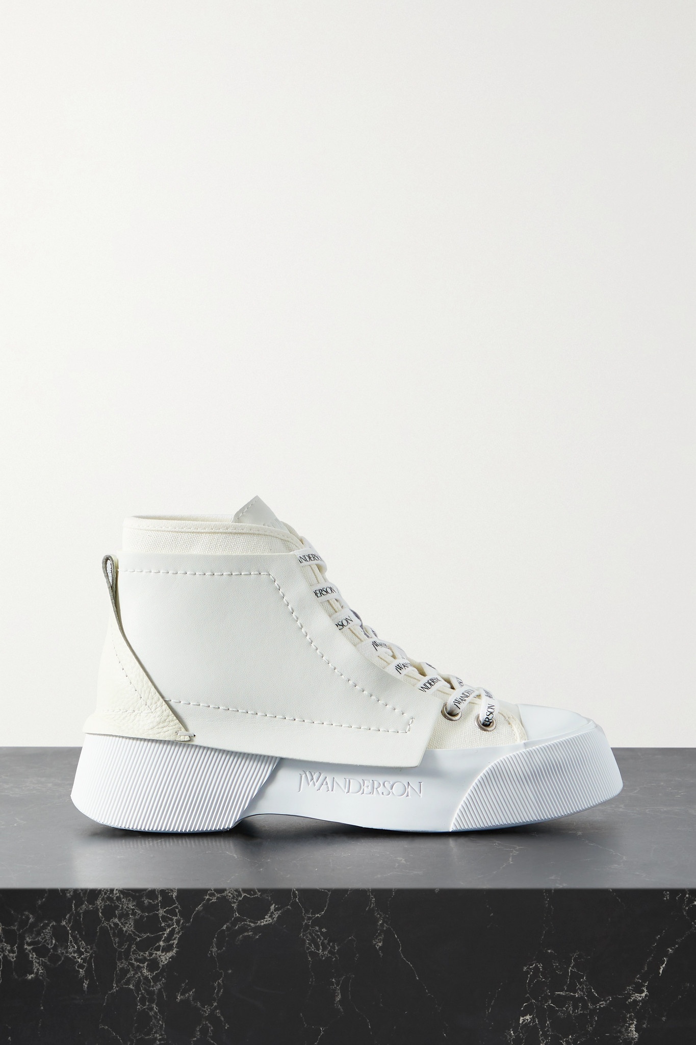 Paneled leather and canvas high-top sneakers - 1