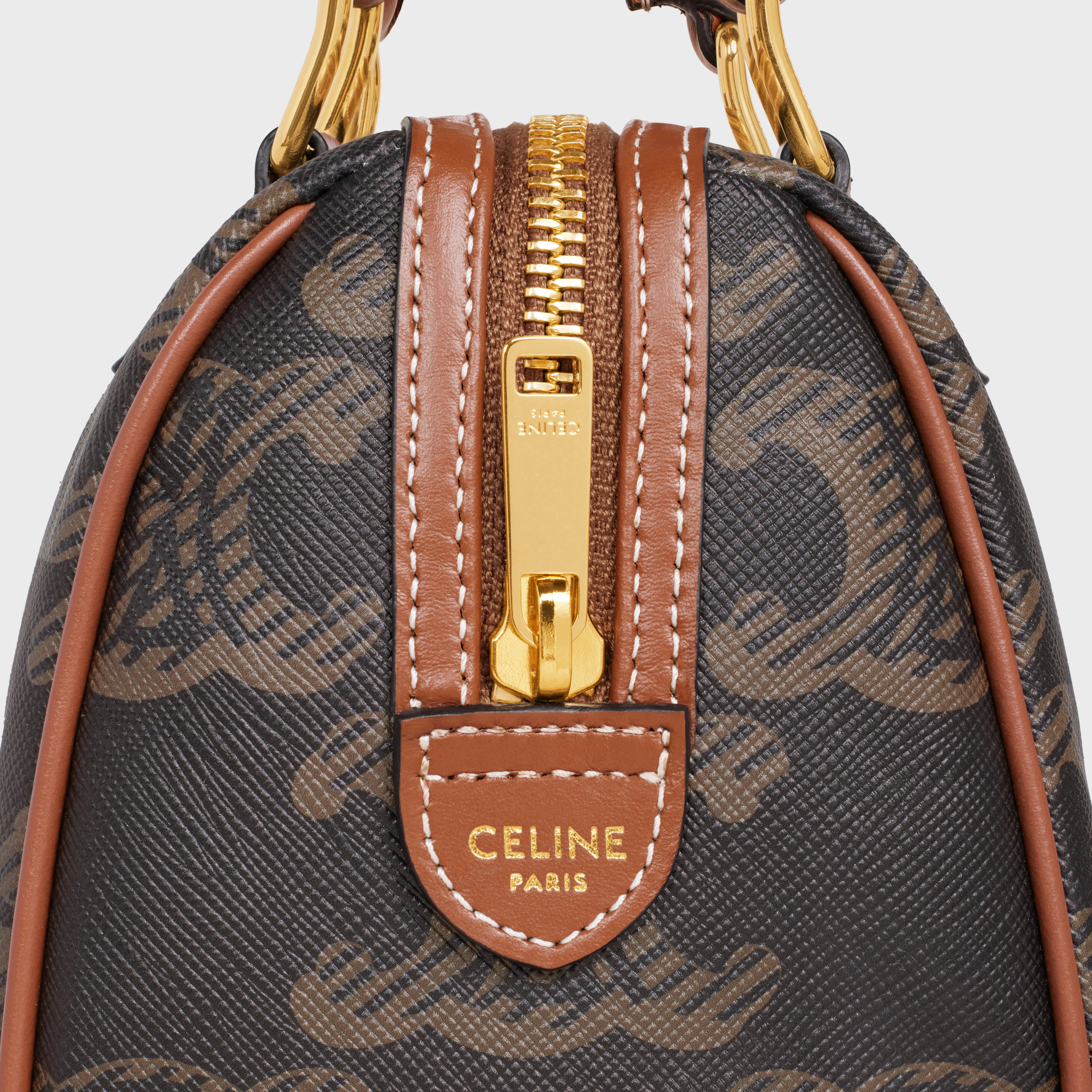 Shop CELINE Triomphe Small boston in triomphe canvas and calfskin