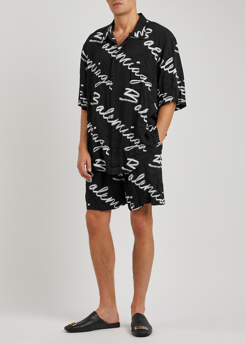 BALENCIAGA Scribble black logo-print crinkled shorts outlook