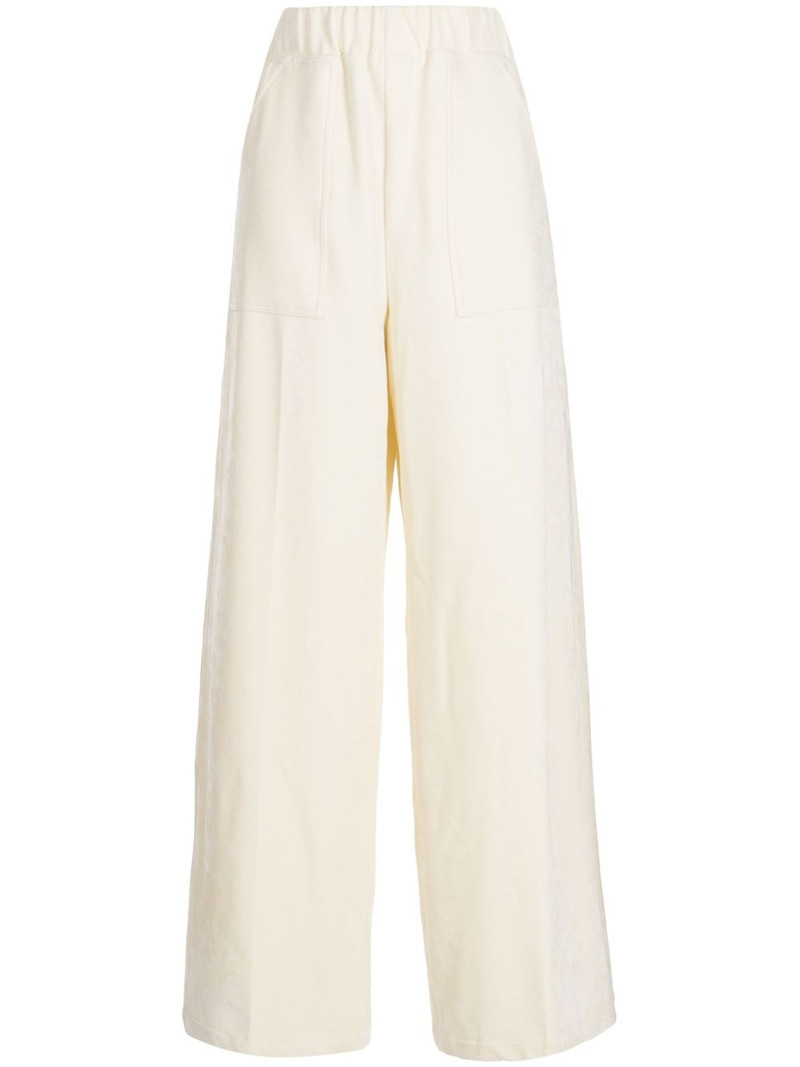 elasticated-waistband velvet-finish flared trousers 1