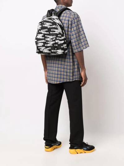 VETEMENTS all-over logo-print backpack outlook