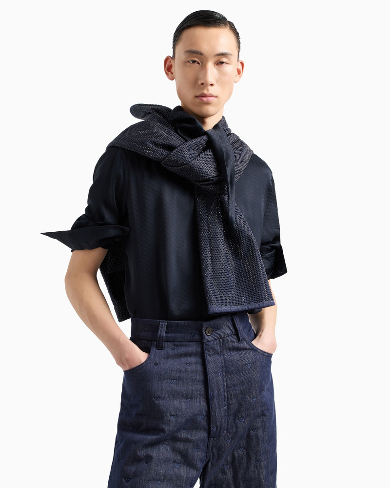 DENIM JEANS WITH ALL-OVER MICRO-EAGLE EMBROIDERY 6