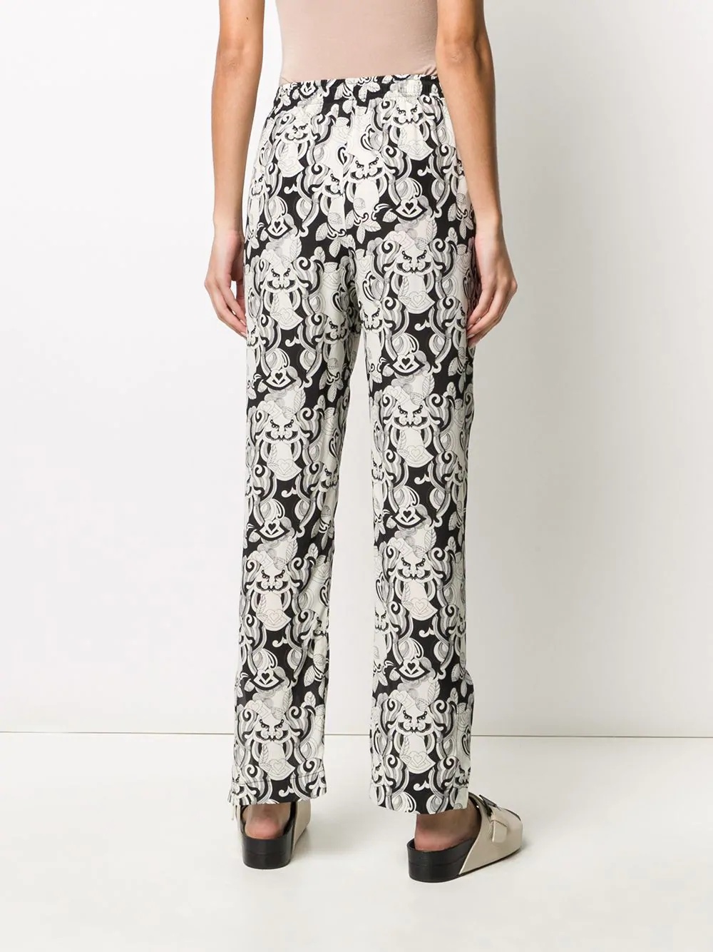 abstract print tapered trousers  - 4