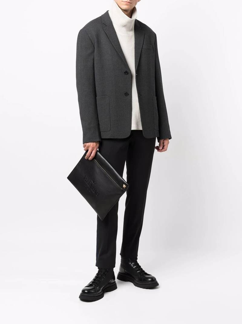 Valentino Rockstud-embellished clutch bag outlook