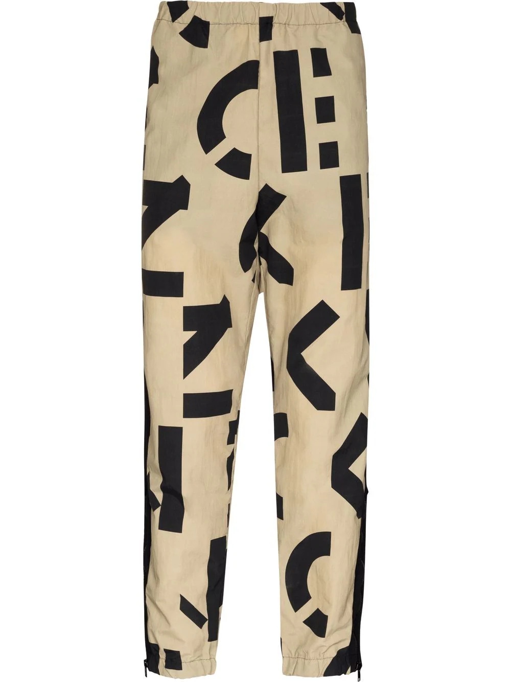 monogram-print elasticated trousers - 1