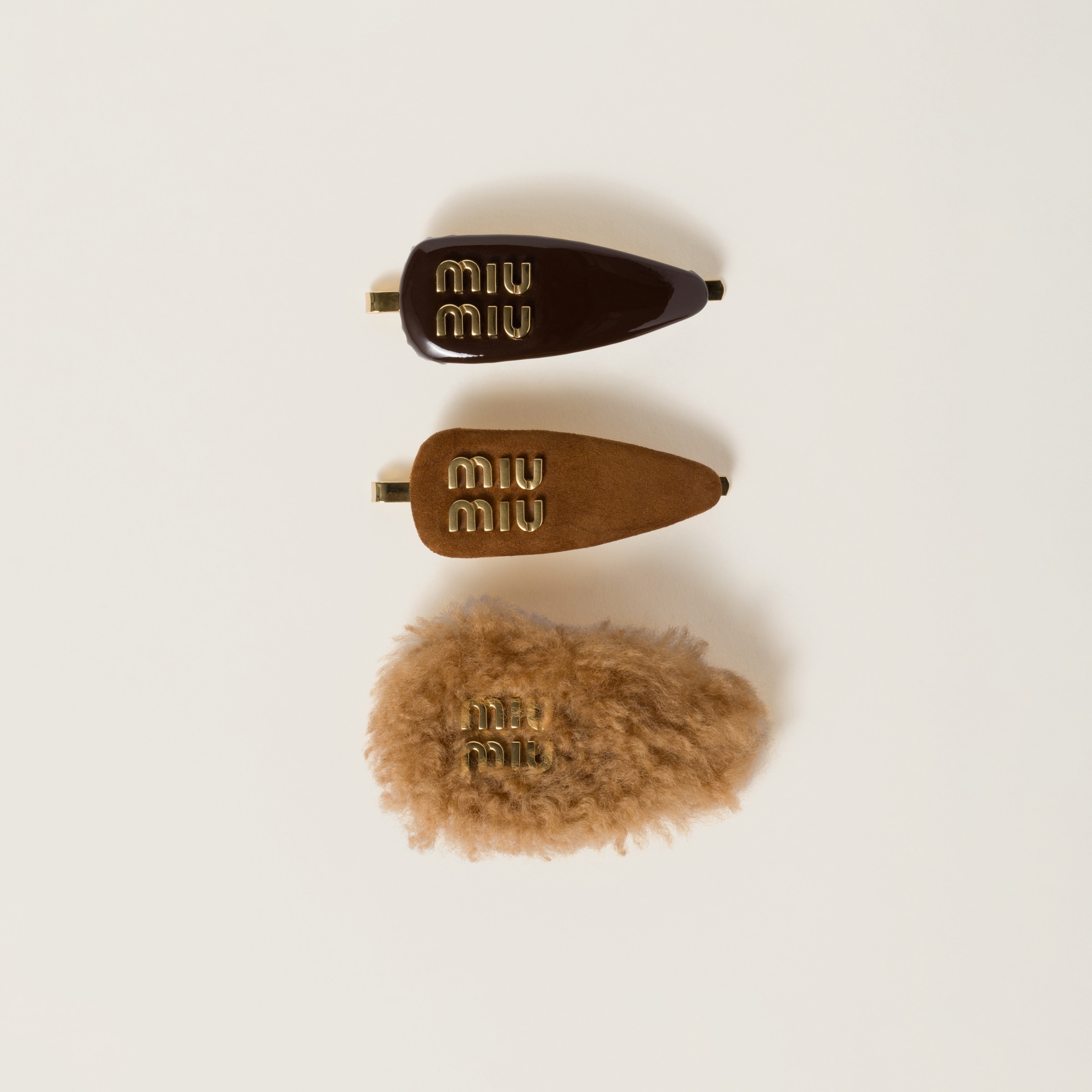Set of leather, suede, and shearling hair clips - 1