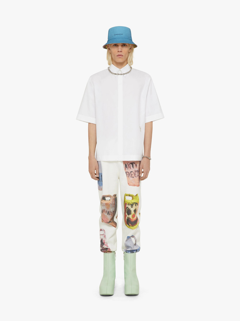 Givenchy JEANS IN DESTROYED DENIM WITH CERAMICS PRINTS outlook