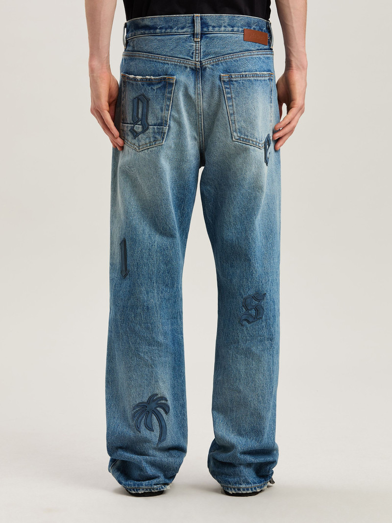 Logo Patch denim pants 5