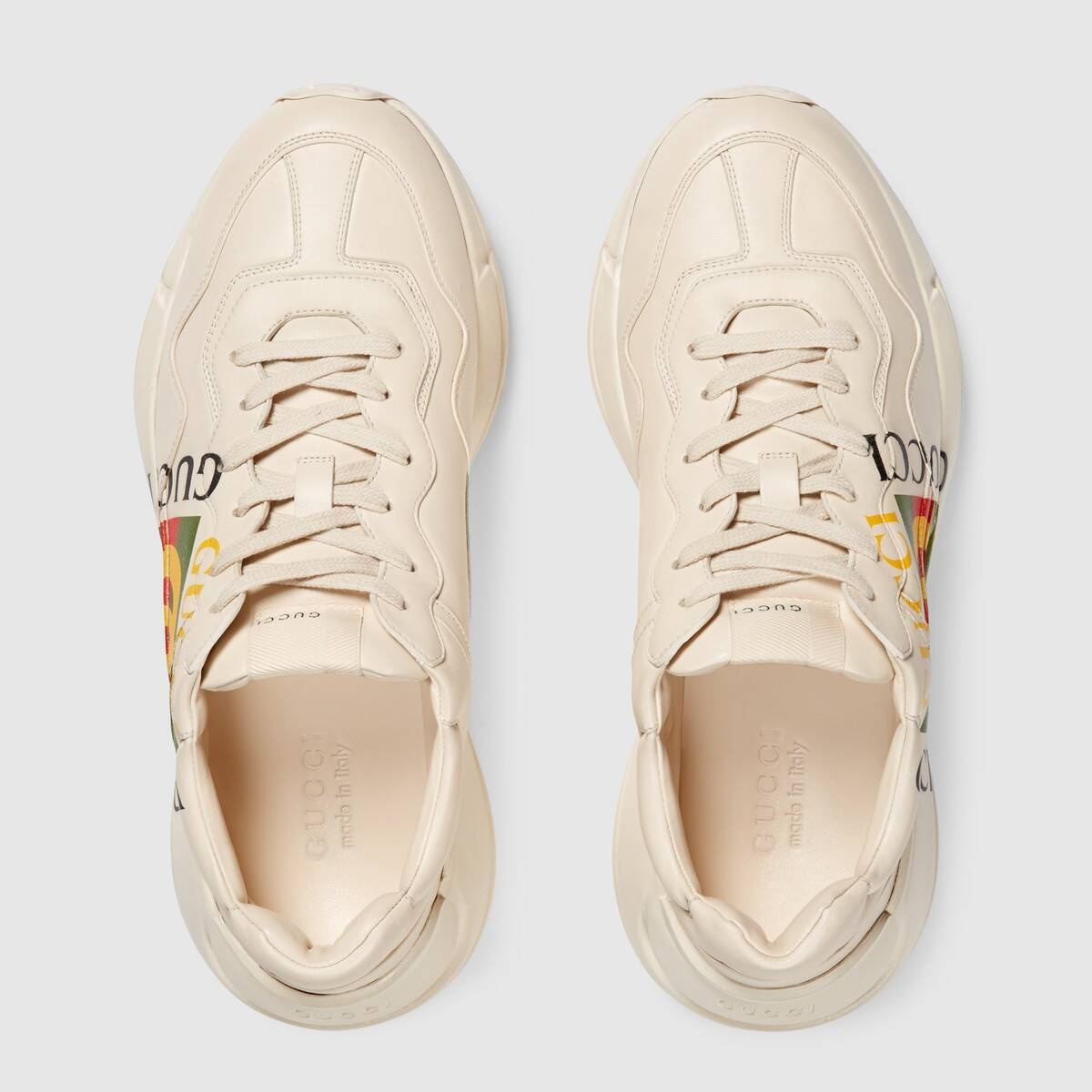 GUCCI Men's Rhyton Gucci logo leather sneaker | REVERSIBLE
