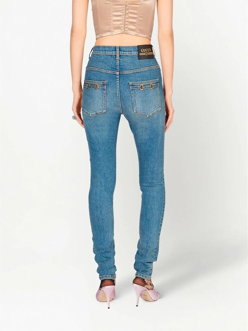 Horsebit-detail stonewashed skinny jeans 4