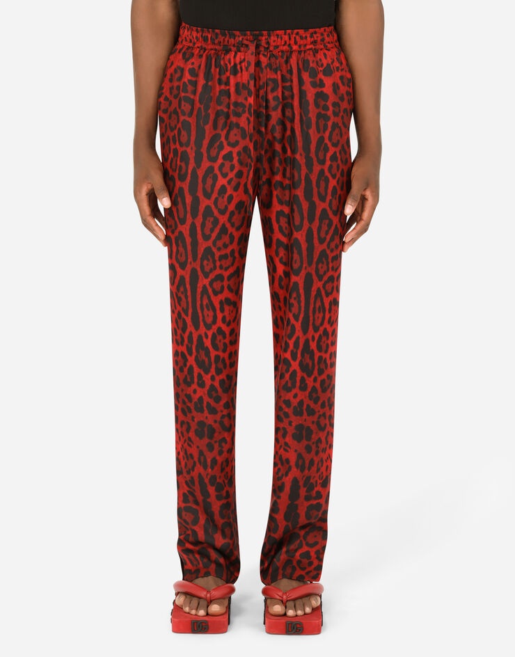 Silk jogging pants with leopard print - 1