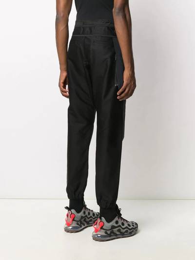 White Mountaineering multi-pocket trekking trousers outlook