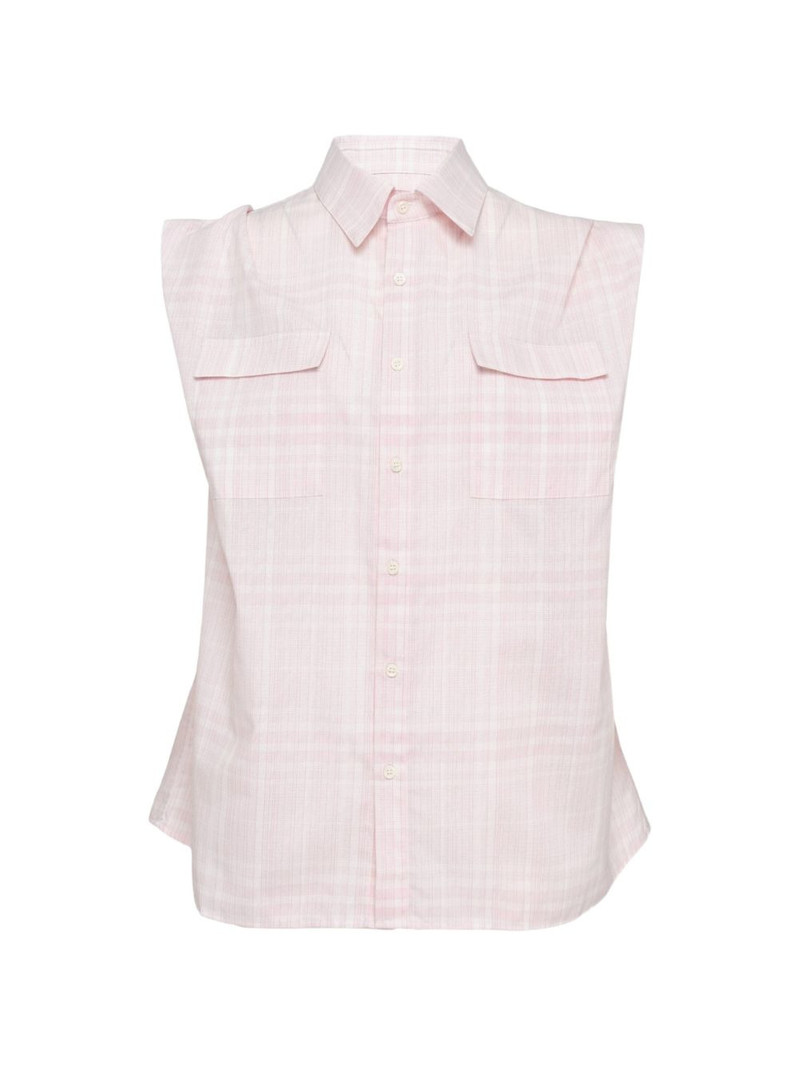 tucked sleeveless shirt 1