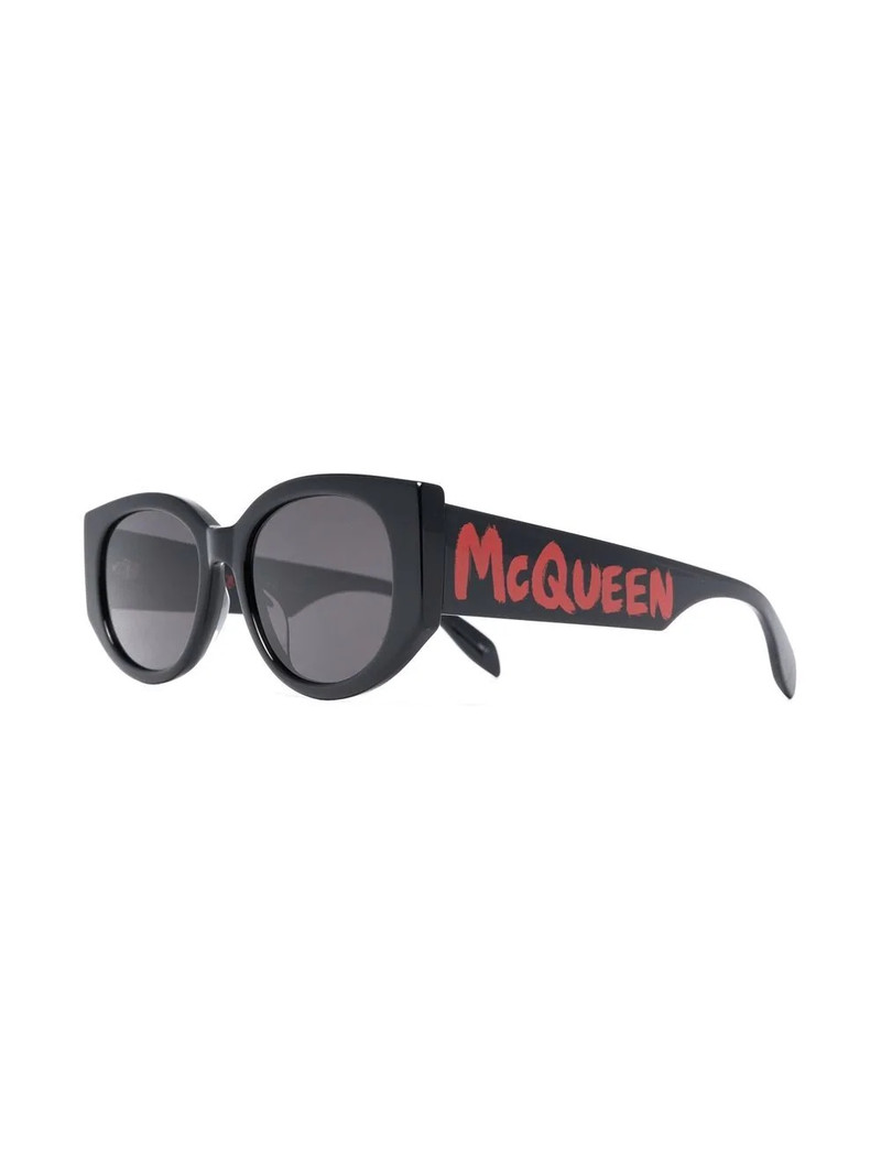 Alexander McQueen Graffiti logo-print oval-frame sunglasses outlook