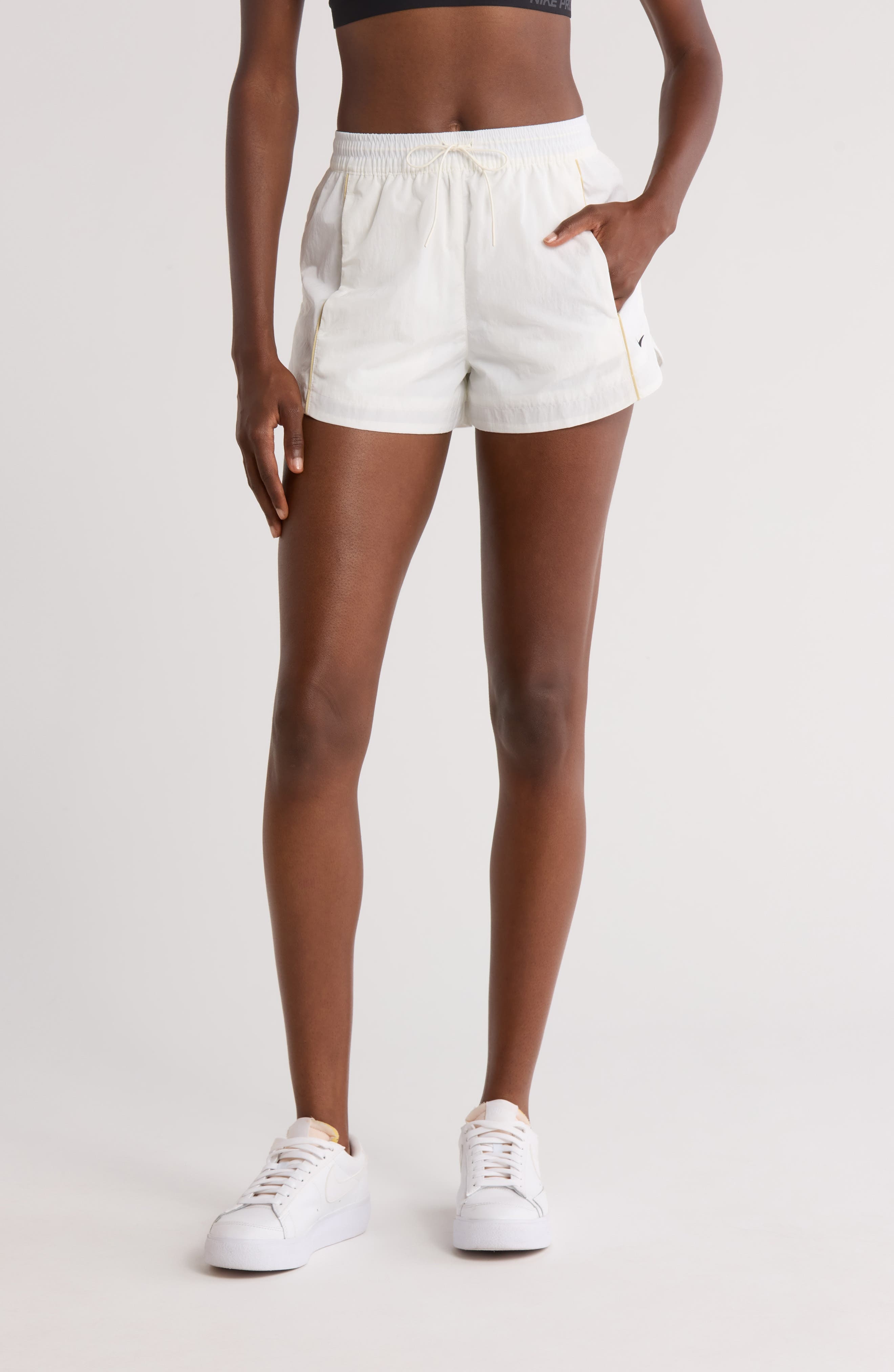 Nike Windrunner Mid-Rise 2-Inch Woven Shorts in Sail/Team Gold/Black at Nordstrom - 1