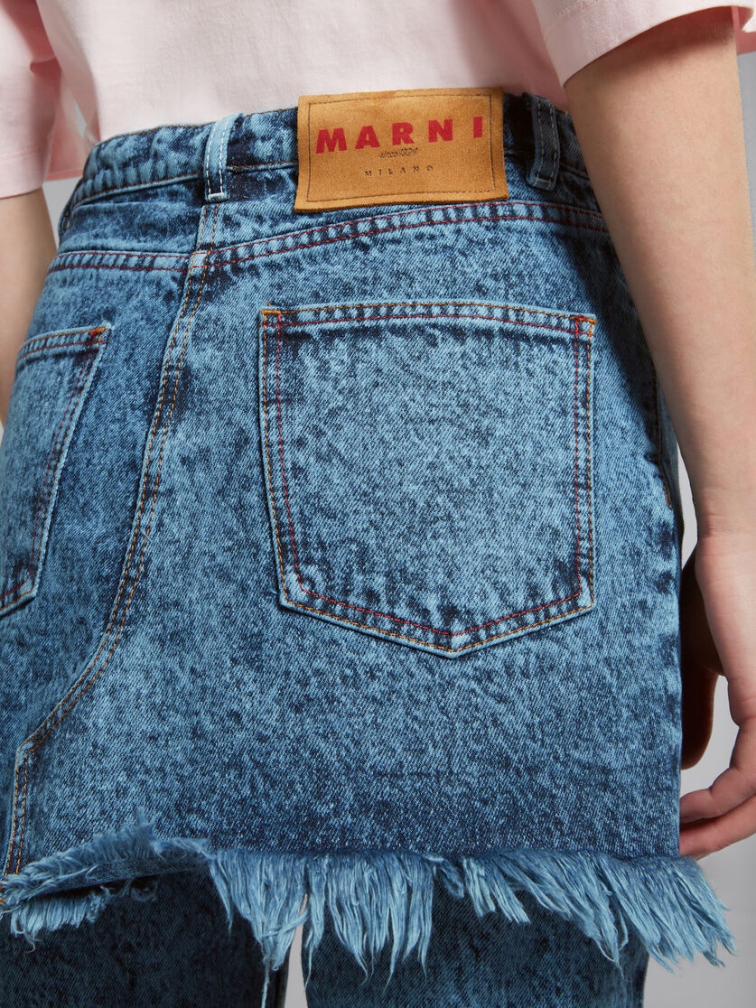 BLUE MARBLED DENIM TROUSERS WITH SKIRT OVERLAY - 4