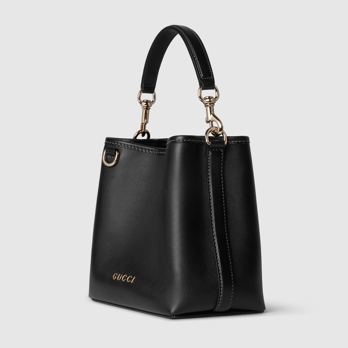 ショルダーバッグ・ポシェット GUCCI MINI GG EMBLEM BUCKET BAG GG Emblem mini bucket bag in beige and white fabric | GUCCI® US