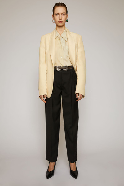 Acne Studios Pleated tapered-leg trousers black outlook