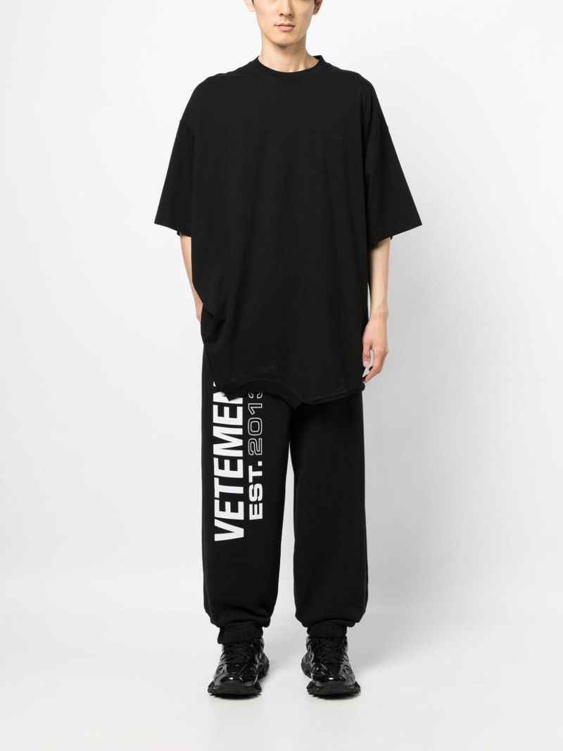 VETEMENTS Flag-logo print track pants outlook